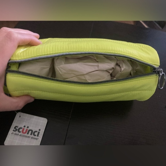 Scünci Neon Yellow cosmetic bag.9”x5”. In size.Zipper closure. Strap to carry - Picture 3 of 4